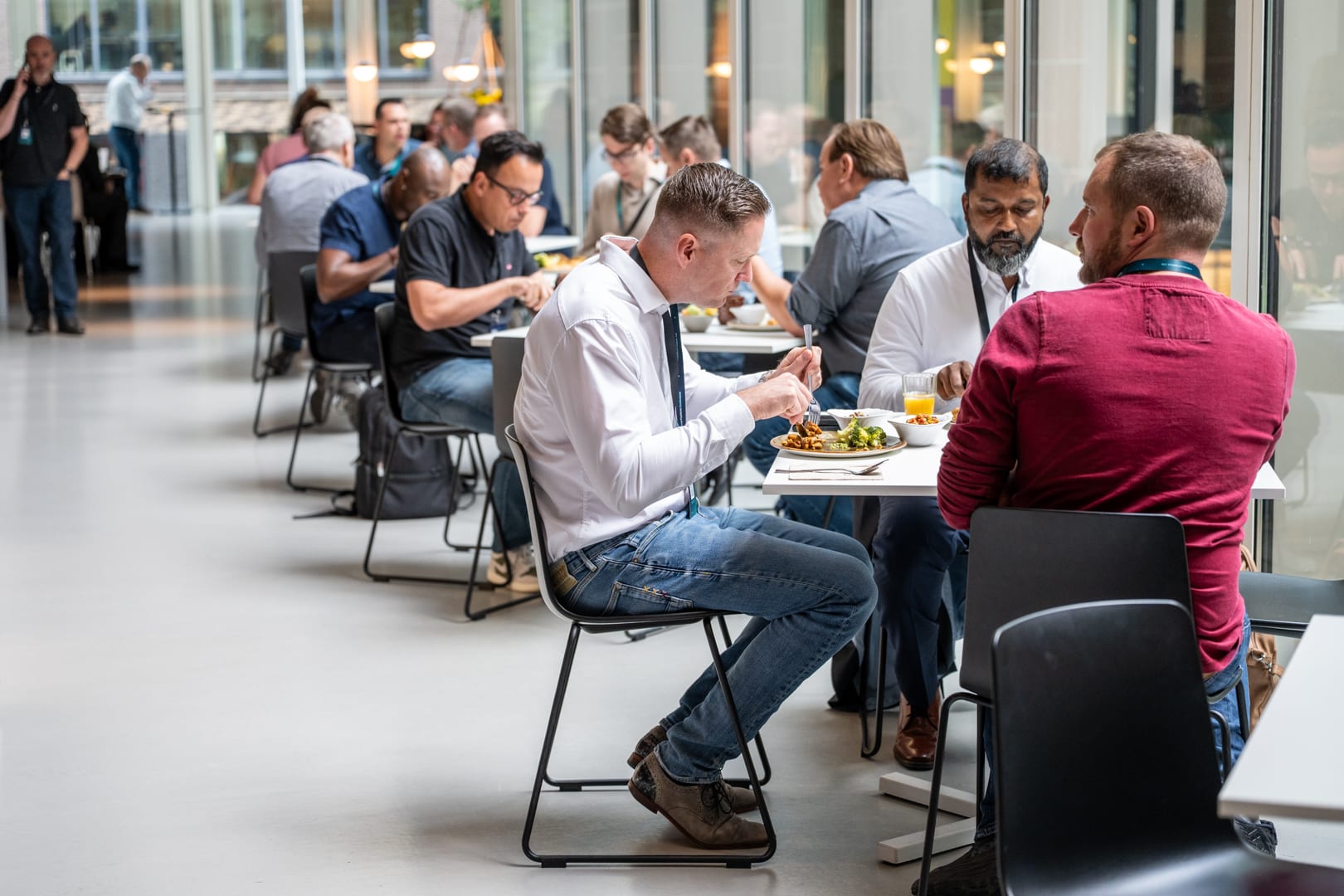 Attendees talking over lunch